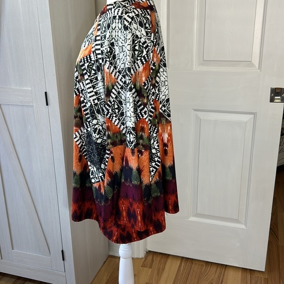 Melissa Paige NWT Black/Orange Long Blouse with front key hole Size 1x - Picture 3 of 11